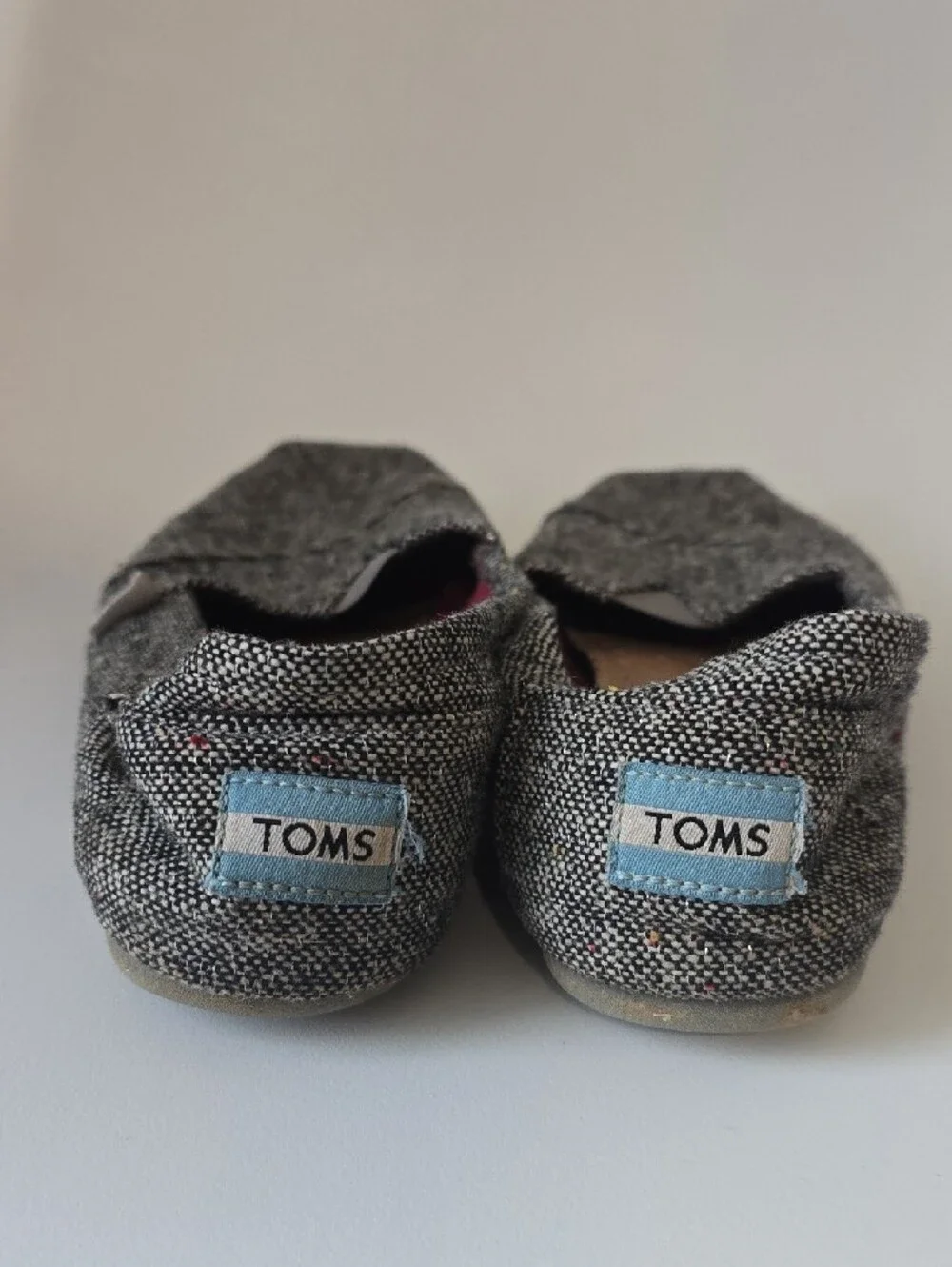 Toms Women's Black & White Metallic Tweed Slip-On Flats with Burgundy Lining